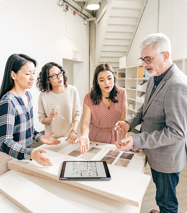 Colleagues collaborating on interior design ideas